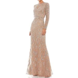 Mac Duggal long sleeve crew neck fully lined sequin gown.